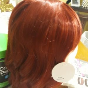 $25 New Wig, bonus wig grip, hair net, and  lack eye lashes.